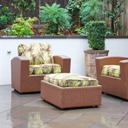 Lighting installed to rear courtyard retaining wall and gardens, highlighting selected planting and outdoor furniture.