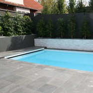  Construction of pool surroundings, including paving, retaining walls, plant selection, plant out
