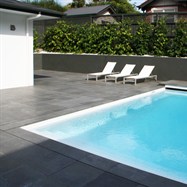   Construction of pool surroundings, including paving, retaining walls, plant selection, plant out