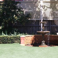   Formal hedging, turf, rose garden, cottage garden with formal pond and screening