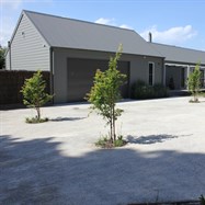   Formal hedging, turf, rose garden, cottage garden with formal pond and screening